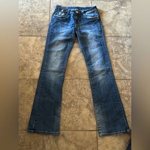 La idol flared low rise jeans